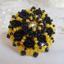 Dorine ring embroidered with black rose cabochons, a Crystal bezel and Jet and Yellow seed beads